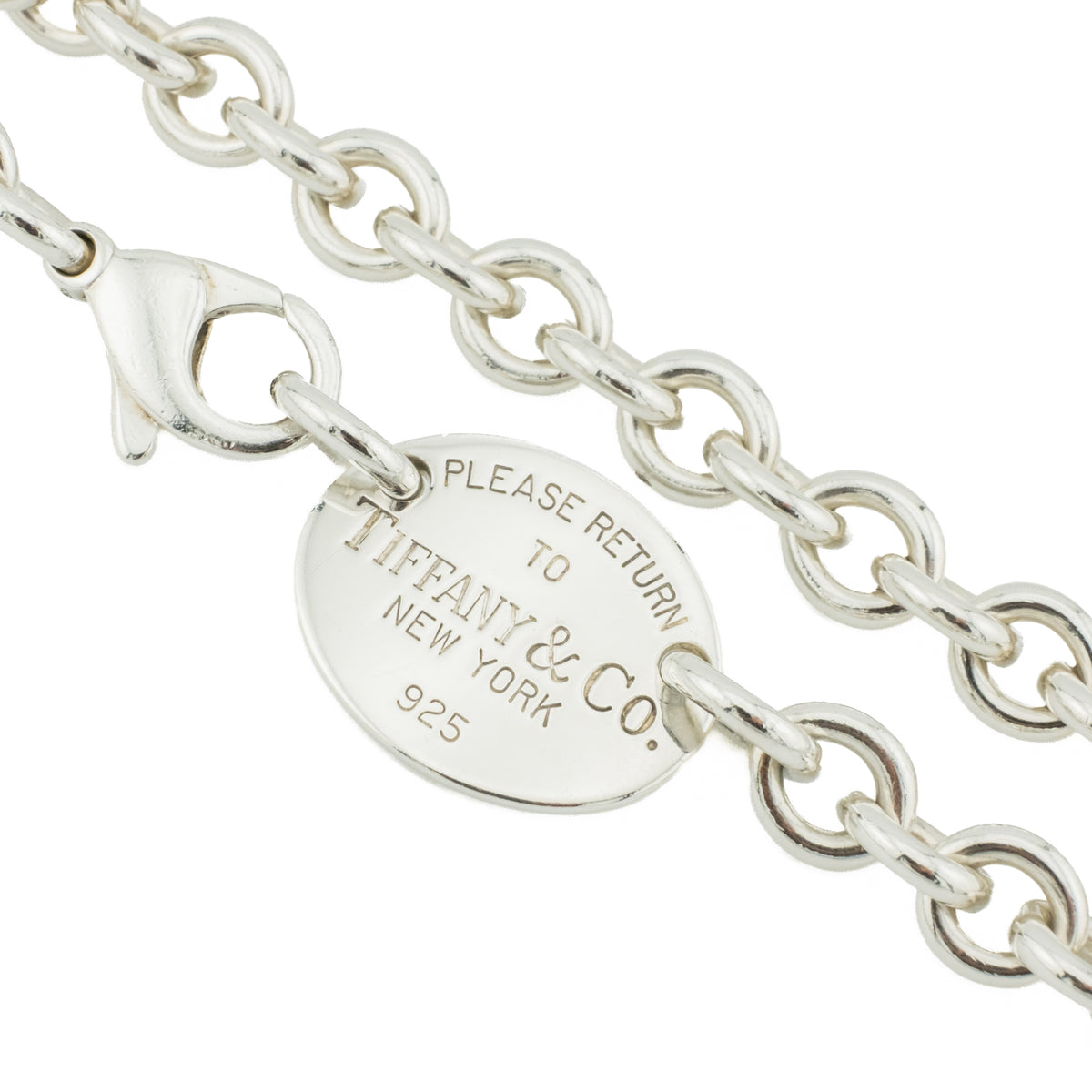 Tiffany & Co. Please Return to Tiffany Oval Tag 15