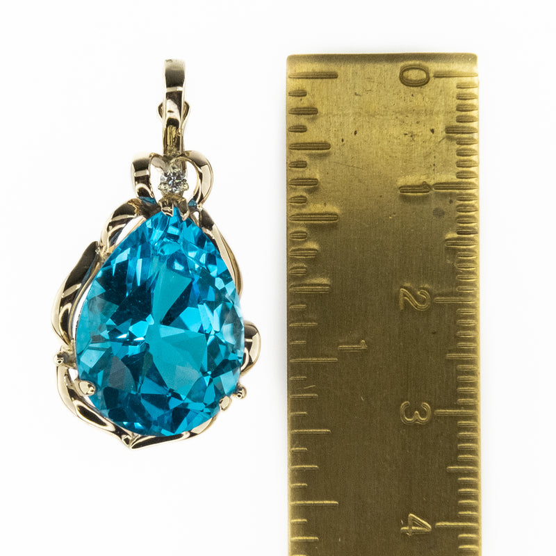 31.46ctw Blue Topaz & Diamond Accented Pendant in 14K Yellow Gold