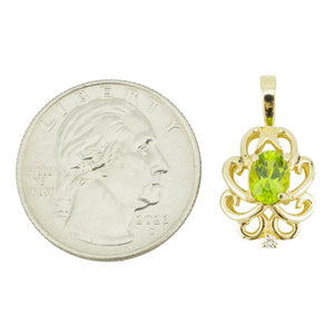 0.490ctw Oval Peridot with Diamond Accent Pendant in 14K Yellow Gold - Chain Not Included