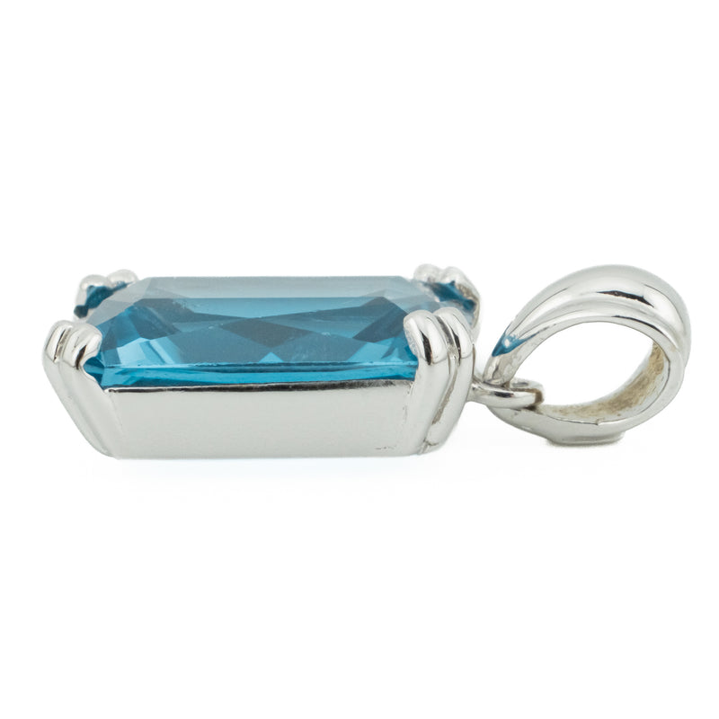 17.56ct Emerald Cut Blue Topaz Pendant in 18K White Gold on 18" Cable Chain in 14K White Gold