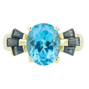2.50ctw Oval Blue Topaz & Accented Ring in 14K Yellow Gold - Size 6.75