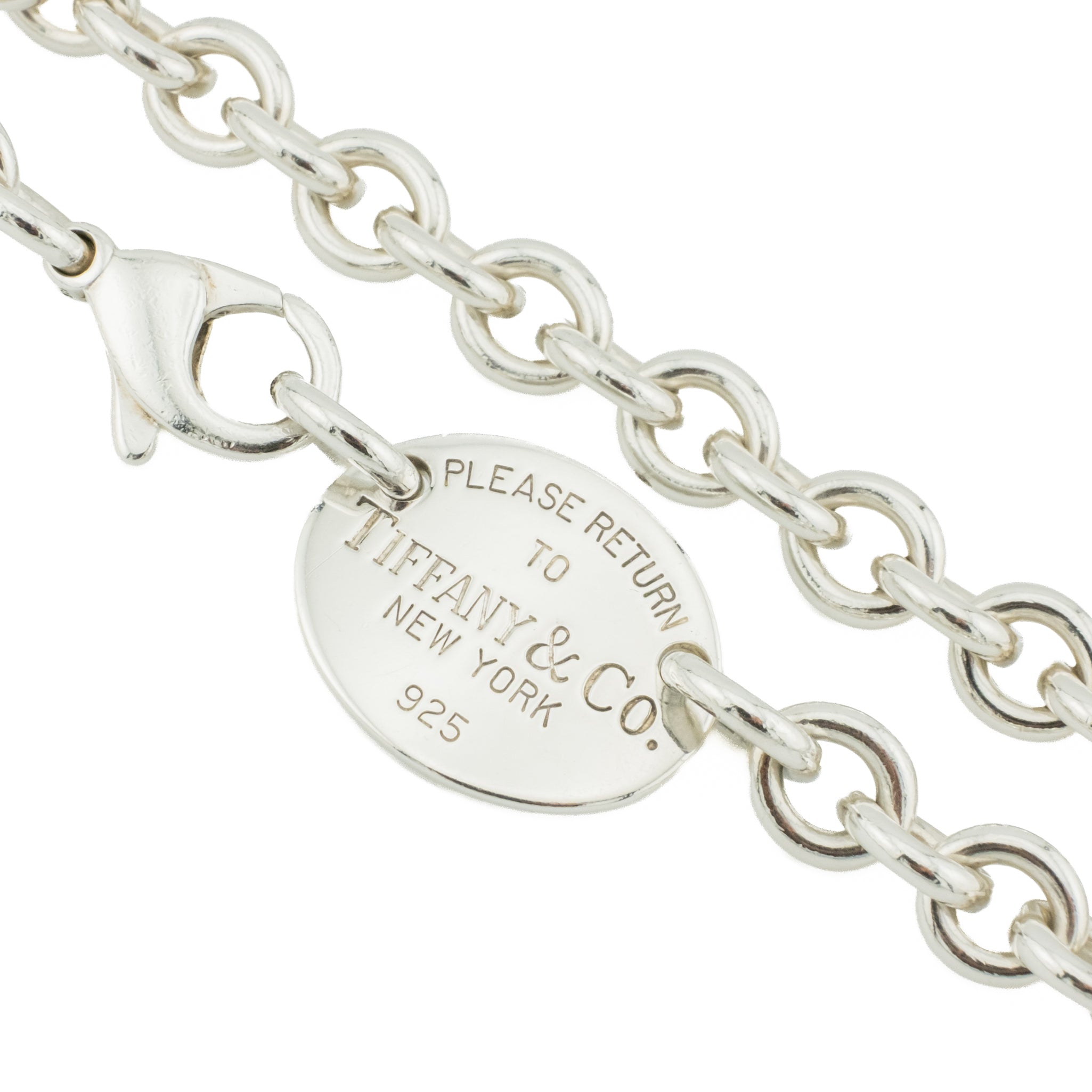 Tiffany & Co. Please Return to Tiffany Oval Tag 15