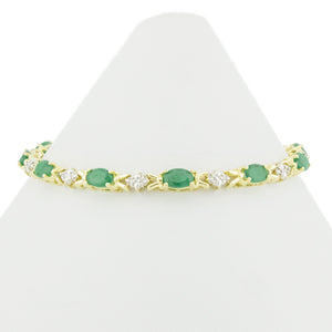 6.45ctw Oval Emerald & Diamond Accented Tennis Bracelet in 14K Yellow Gold - 9.7 Grams