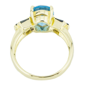 2.50ctw Oval Blue Topaz & Accented Ring in 14K Yellow Gold - Size 6.75