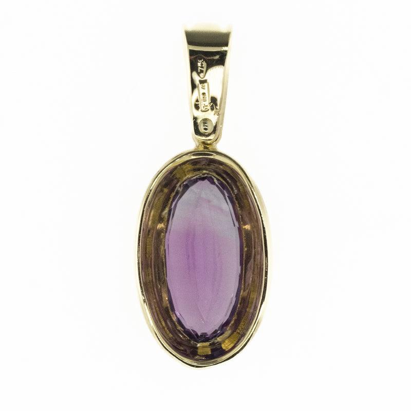 5.76ctw Oval Amethyst Solitaire in 18K Yellow Gold