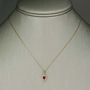 Ruby & Diamond Accented Oval Halo Pendant on 18" Chain Necklace in 10/14K Yellow Gold Pendants with Chains Oaks Jewelry 